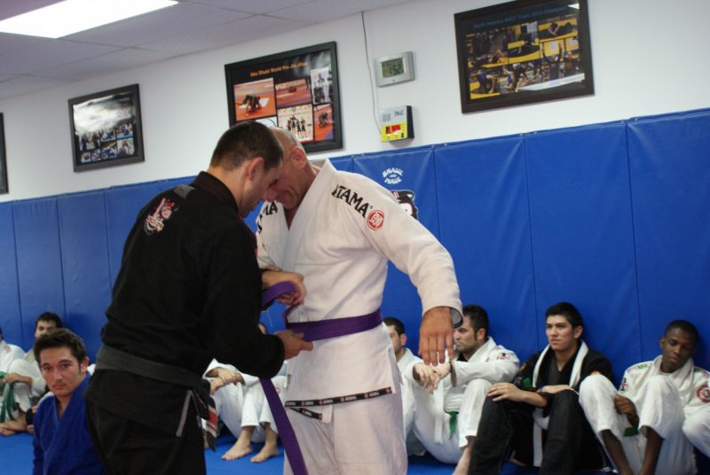 Brazilian Jiu Jitsu Chiropractor, Dr. Paul Goodkin, receiving his Purple Belt under Vagner Rocha