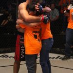 Vagner Rocha hugging his daughter and son after his victory.